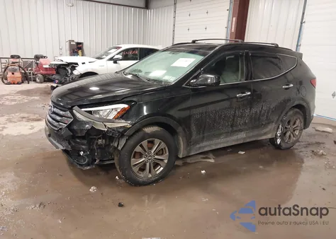 2014 Hyundai Santa Fe Sport 2.4L z USA, uszkodzony, nr VIN 5XYZUDLB2EG155876